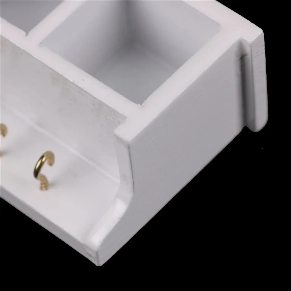Miniature Wall Rack with Hooks — angled close-up