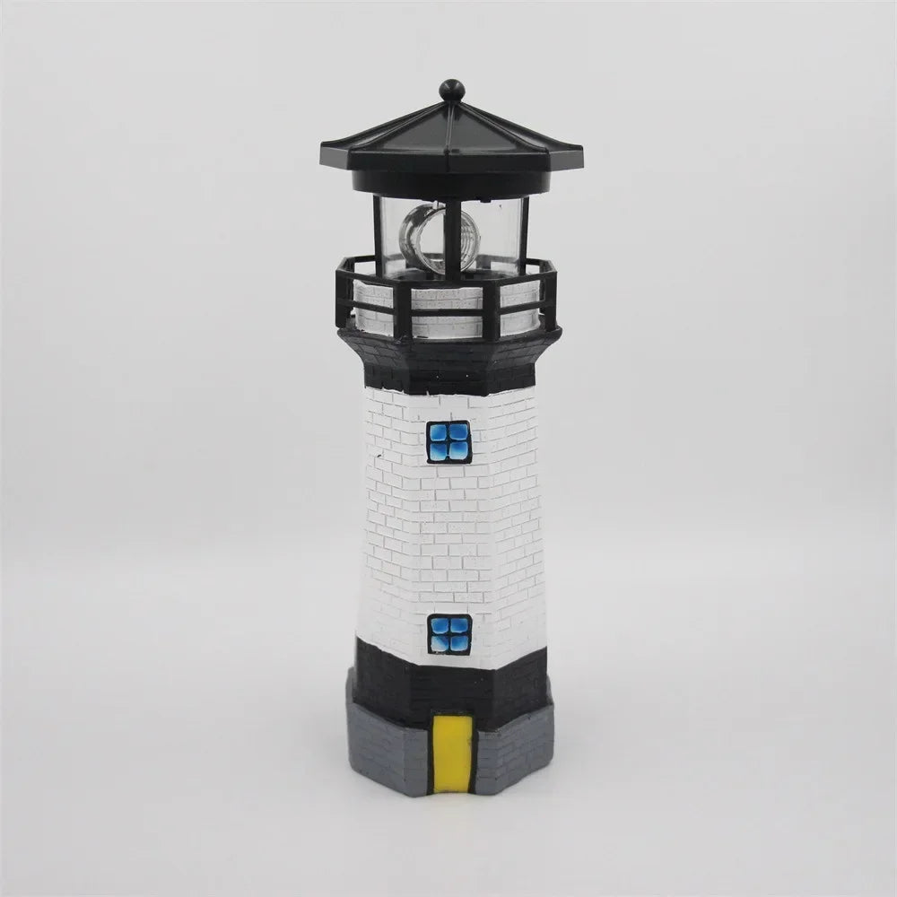 Solar Rotating Lighthouse Resin Garden Sculpture — scene view